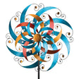 Close-up view of the crescent-shaped blades and sparkling faceted acrylic gems on the Triple Wind Spinner, with metallic blue, gold, and copper paint shimmering in the sun