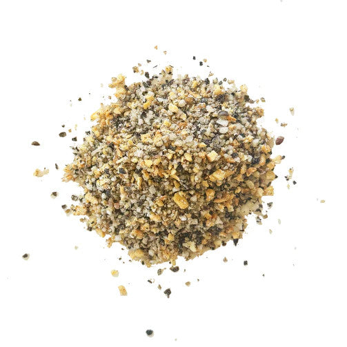 a large pinch of garlic & pepper sea salt on a white background