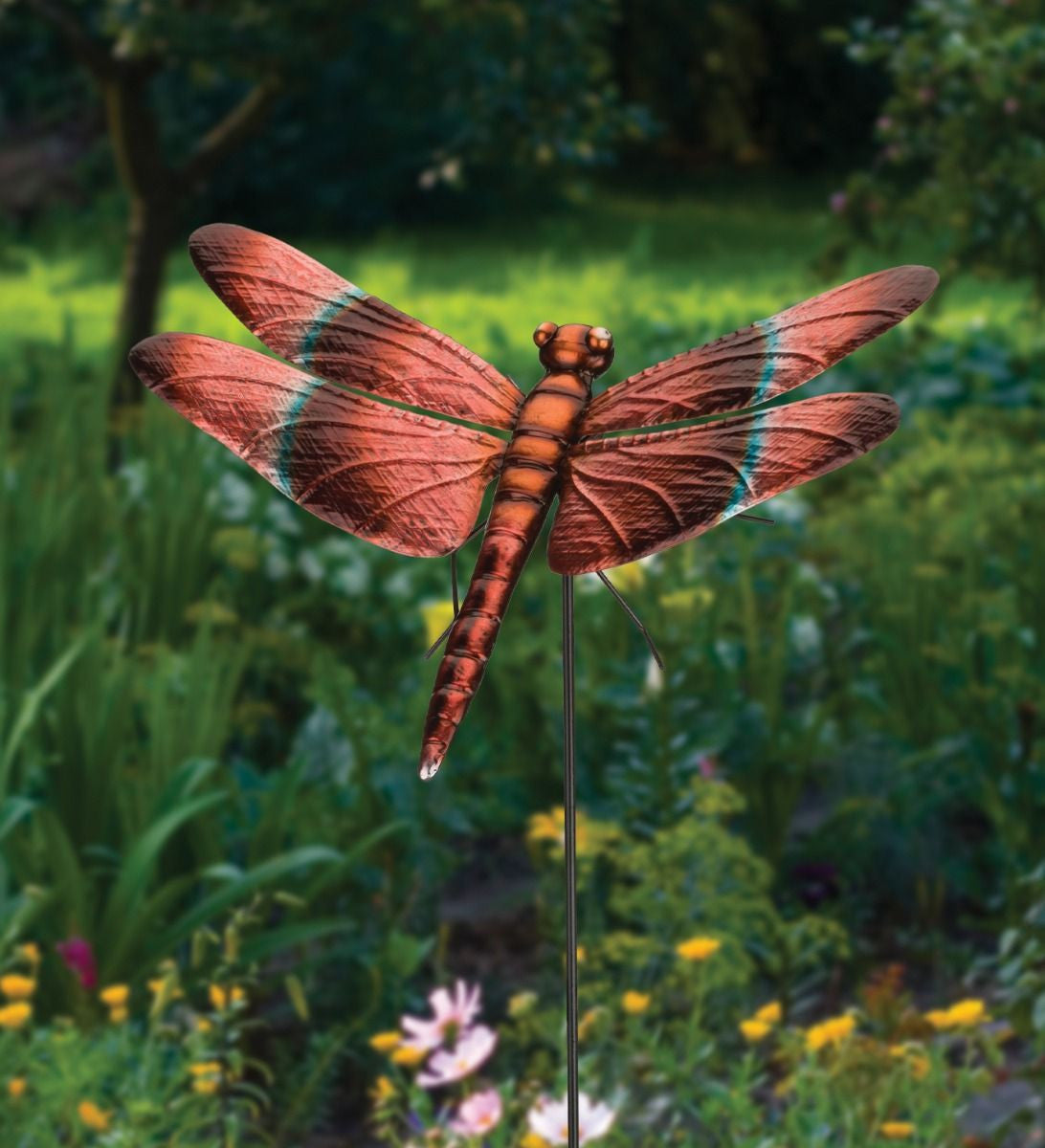 close up of Meadowhawk dragonfly stake displayed in a lush garden, surrounded by flowers and greenery to illustrate its outdoor charm