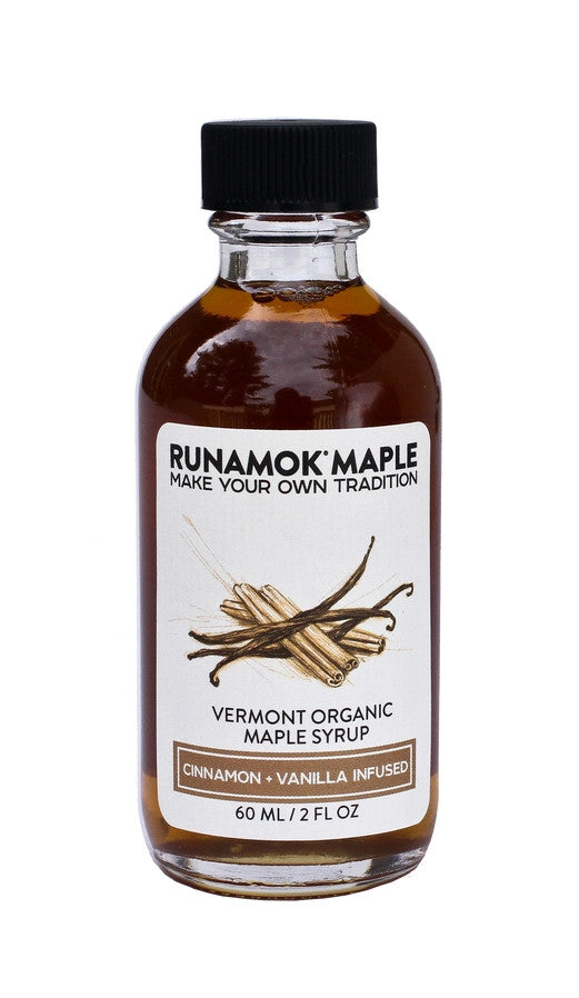 a bottle of the cinnamon and vanilla infused maple syrup from the pantry favorites collection against a white background