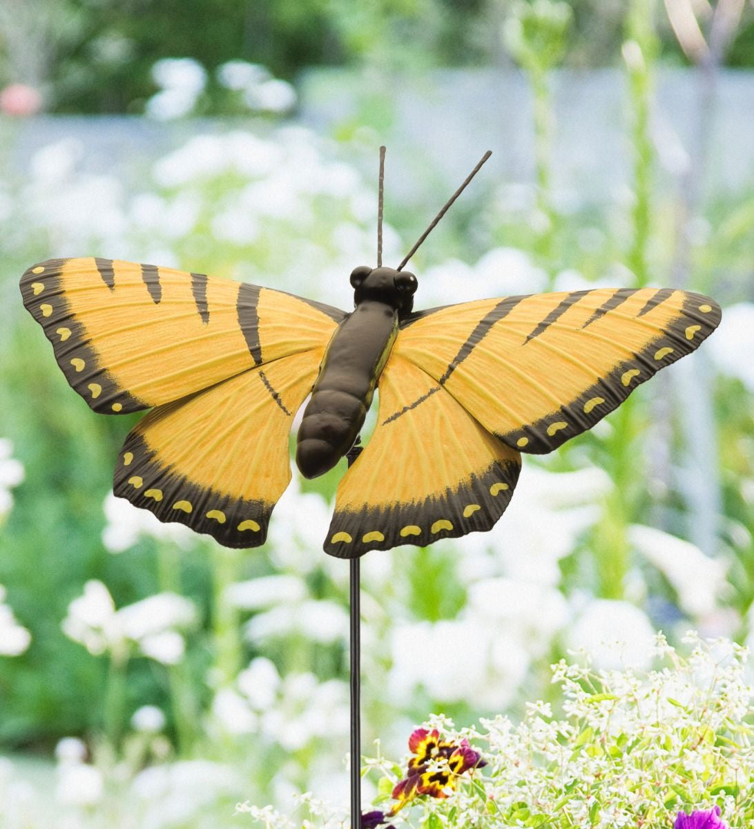 close up of Swallowtail butterfly stake displayed in a lush garden, surrounded by flowers and greenery to illustrate its outdoor charm