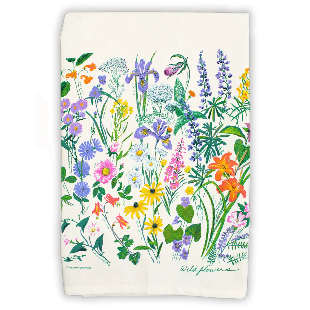 Floral patterned towel with colorful wildflowers on a white background