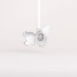 the backside of the Bluebird ornament showing the pewter material and Danforth Pewter maker's seal