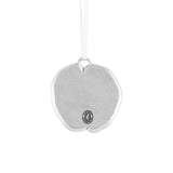 Back view of the Poppy Ornament displaying the maker's seal, indicating its handcrafted quality