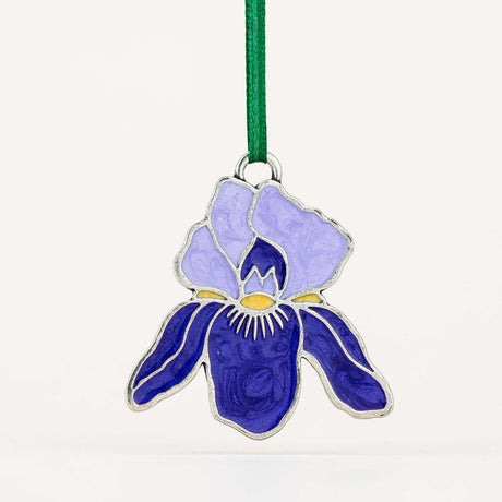 Decorative ornament with a purple and blue flower design on a white background