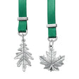 Two silver leaf pendants on green ribbons with silver clasps against a white background