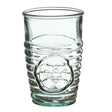 a clear drinking glass with ribbed texture on the lower half with a circular emblem of a bee