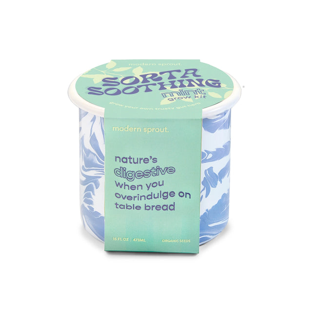 an enamel mug with white and periwinkle blue swirl print and a light green package wrap with text "Sorta Soothing Mint - nature's digestive when you overindulge on table bread"