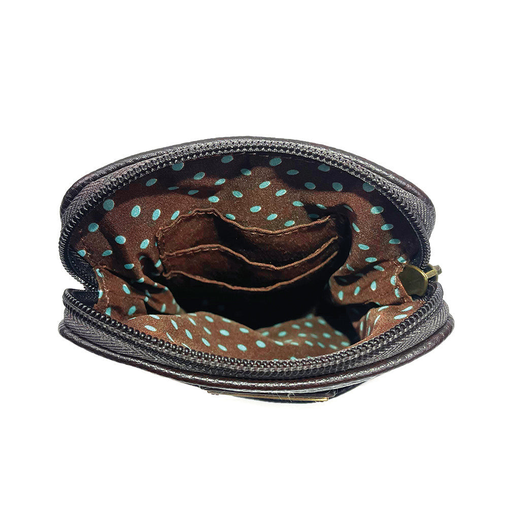 a look inside the bag showing the inner lining details pocket, and credit card slots