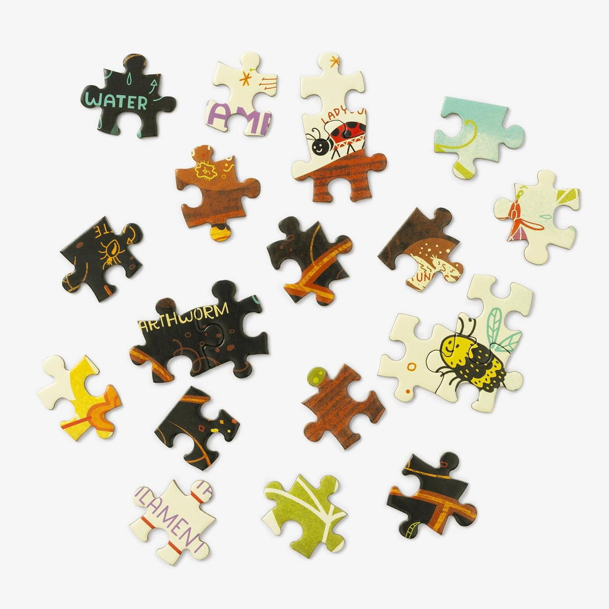 Set of colorful puzzle pieces with various designs on a white background