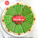 A circular decorative cookie centerpiece made up of wedge-shaped cookies decorated like Christmas Trees with a stylish ornate oval center cookie that is decorated and says "Merry Christmas" showing the creative possibilities of this cookie cutter