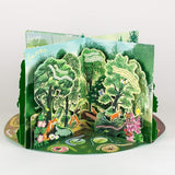 Pop-up card with a summertime forest design and animals on a white background