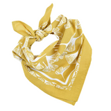 Yellow bandana with white ginkgo leaf pattern on a white background