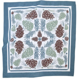 Fabric bandana with pine cone and leaf pattern on a blue background