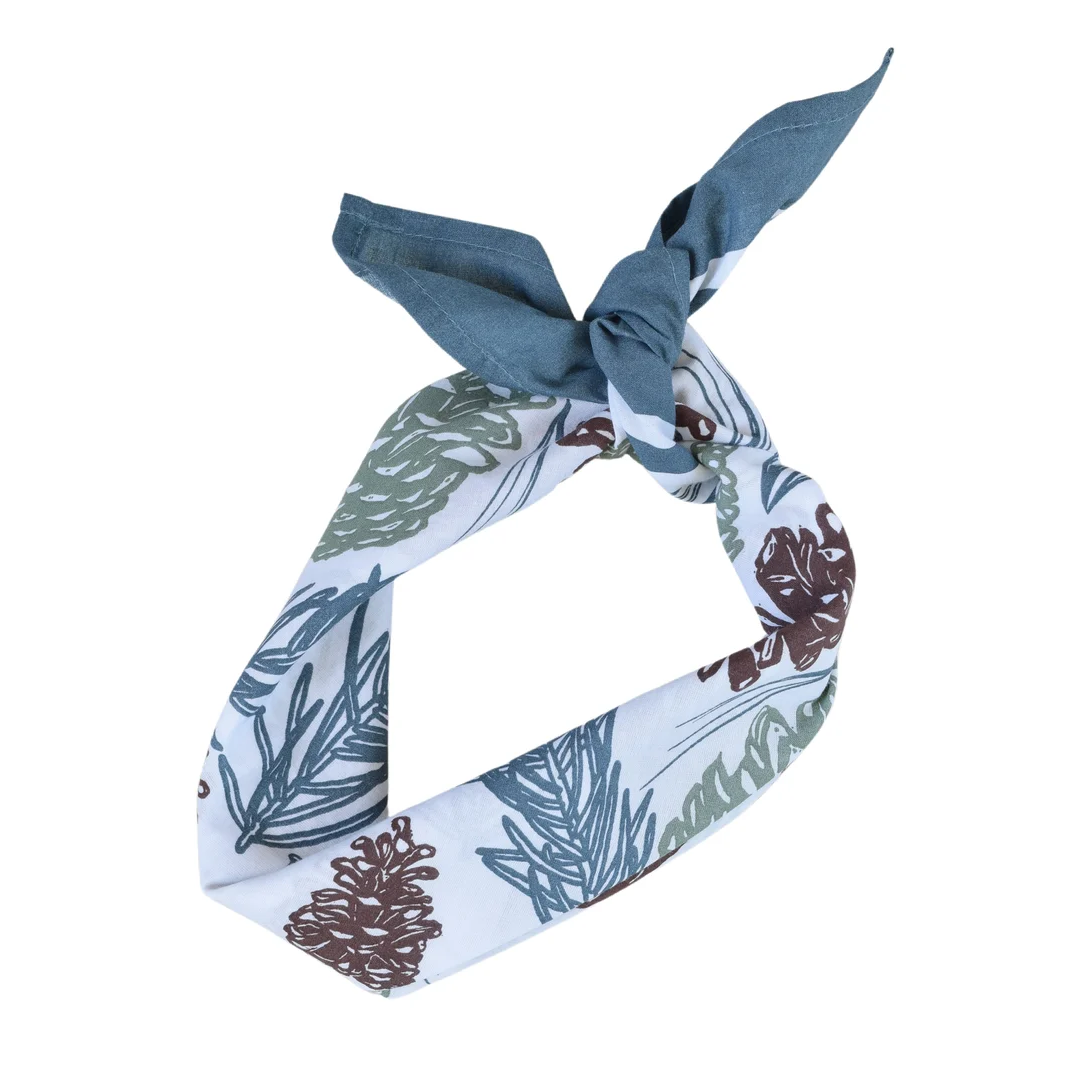Neckerchief with nature-themed pattern on a white background