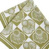 folded bandana with tree ring pattern on a green and white checkered background