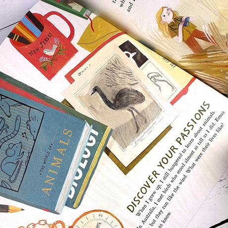 Stack of books with illustrations on a white surface