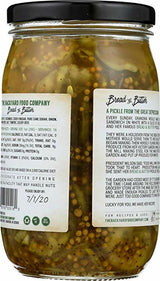 Back view of a jar of TheraHay Farm Company Bread & Butter pickled onions, showing the black lid, clear glass jar filled with yellowish onions, and two white product labels.