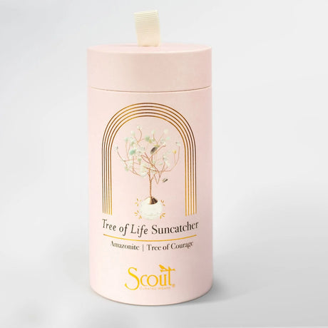 White cylindrical container with 'Scout' branding and 'Tree of Life Suncatcher' design on a light gray background