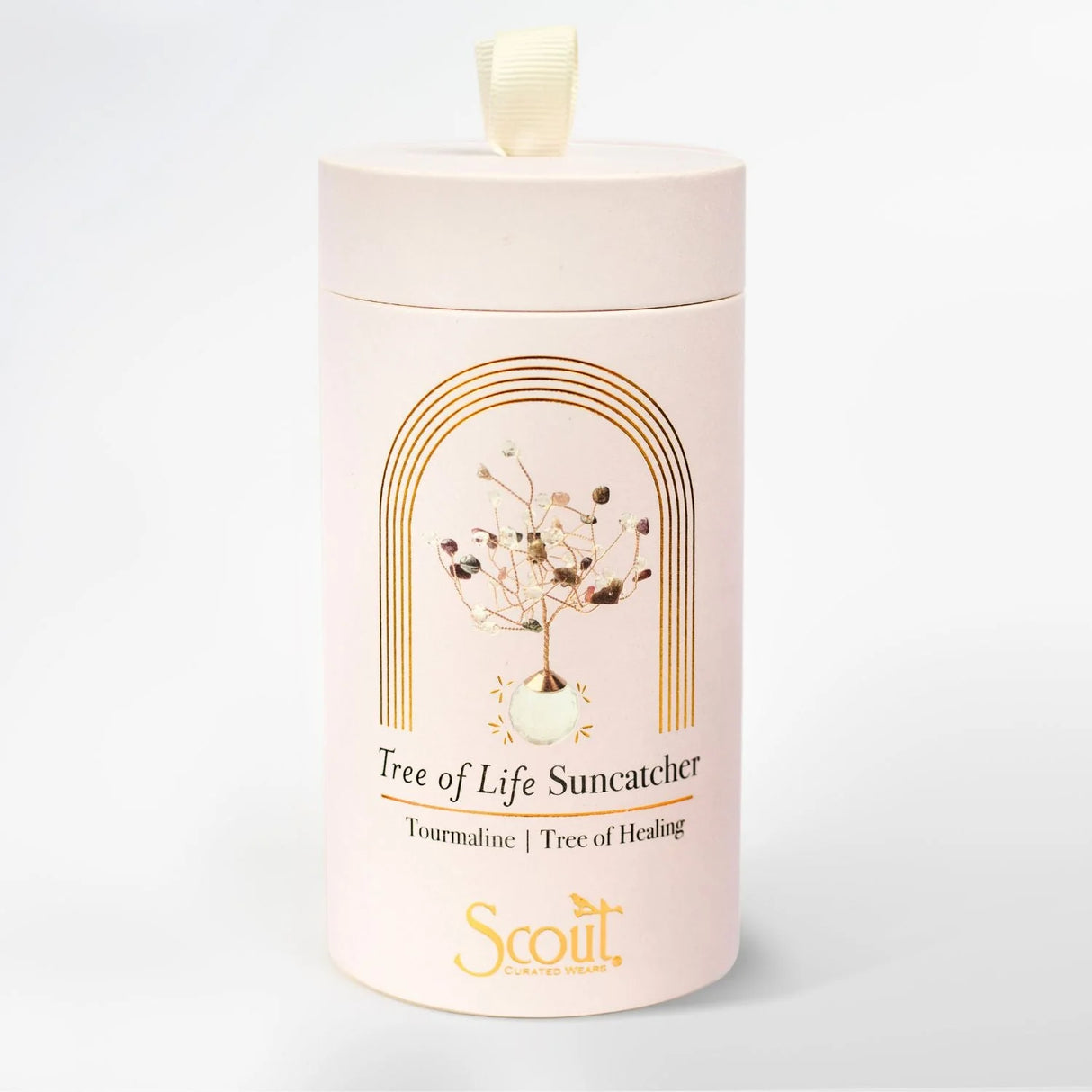 White cylindrical container with 'Scout' branding and 'Tree of Life Suncatcher' design on a light gray background