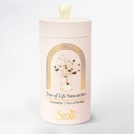 White cylindrical container with 'Scout' branding and 'Tree of Life Suncatcher' design on a light gray background