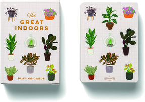The Great Indoors Playing Cards box and deck side by side featuring charming illustrations of a variety of potted houseplants set against a crisp white grid background