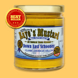 a jar of Raye's Down East Schooner mustard in glass jar with gold lid
