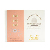 Scout suncatcher packaging with dragonfly design on a white background