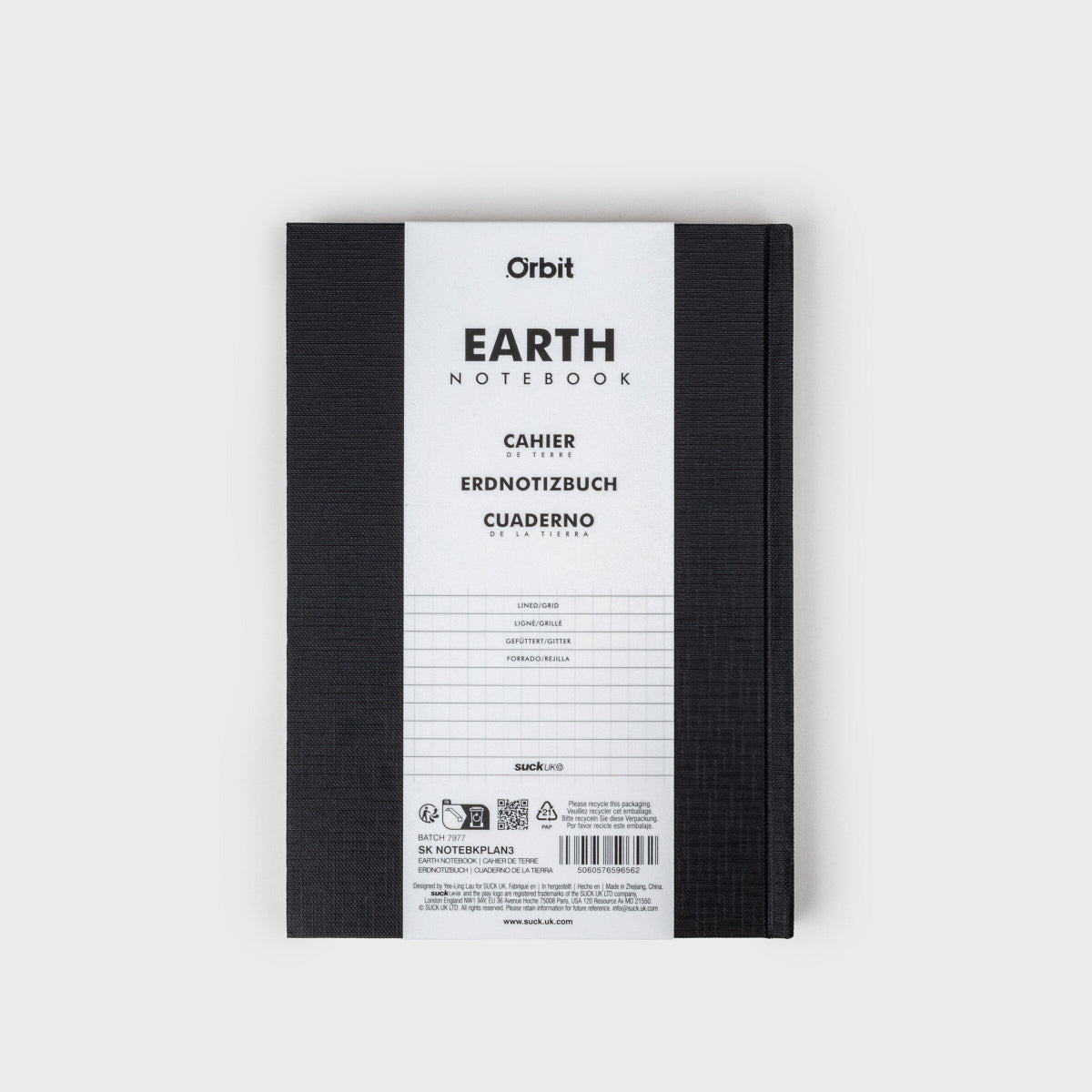 Black notebook with white label on a light gray background