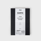 Black notebook with white label on a light gray background