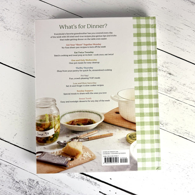 Book cover with a checkered pattern on the right side, featuring a table setting with food and a jar.