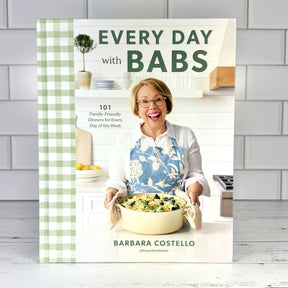 Cookbook titled 'Every Day with Babs' by Barbara Costello on a kitchen background