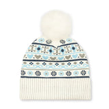 A cream-colored knit beanie hat featuring a white faux fur pom-pom on top and a colorful Fair Isle pattern with light blue, navy, and gray motifs on the upper section, finished with a solid cream ribbed cuff.