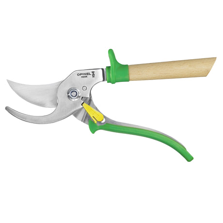 Gardening shears with green handles on a white background