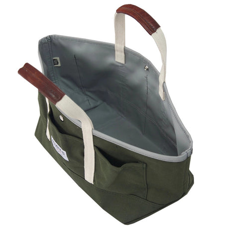 an above angle view of the tote shown empty to feature the interior space of the tote