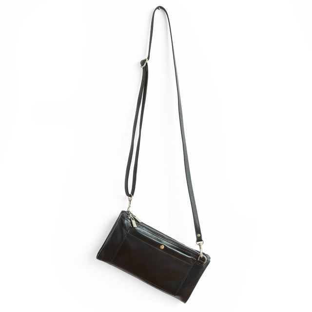 A black leather crossbody bag with a long adjustable strap and silver-tone hardware, shown against a plain white background.