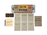 the package and contents of the grow pizza garden kit: seeds, starter soil, wooden plant ID sticks, pencil, pizza recipes, growing instructions
