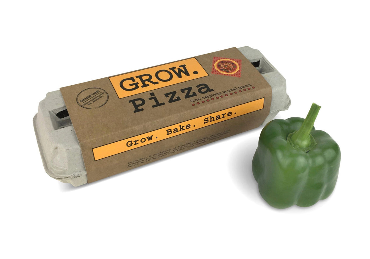 The Grow Pizza garden kit in package alongside a fresh green bell pepper