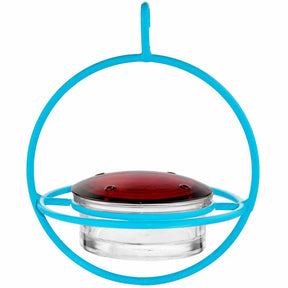 the Aqua hummingbird feeder against a white background - aqua globe shape with a clear glass feeder in the center with red glass lid