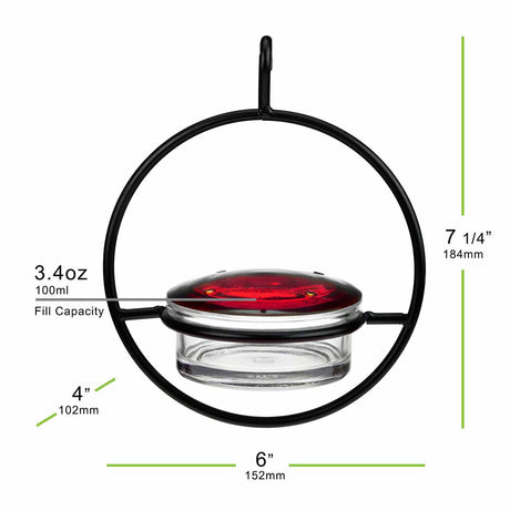Hanging bird feeder with dimensions and fill capacity on a white background - measures 7.25 inches tall, 6 inches wide, 4 inches deep, with a 3.4 ounce fill capacity