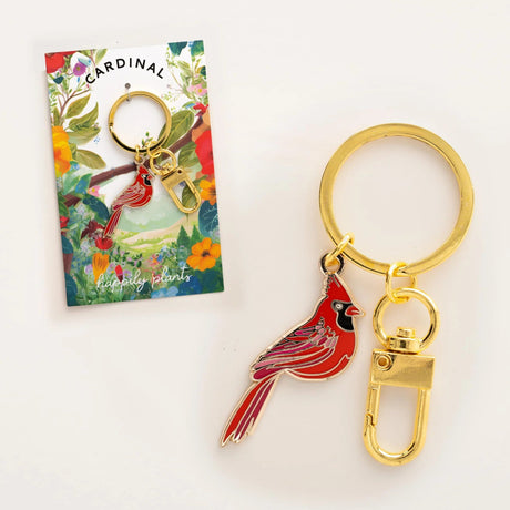 Cardinal keychain with gold clip on a white background