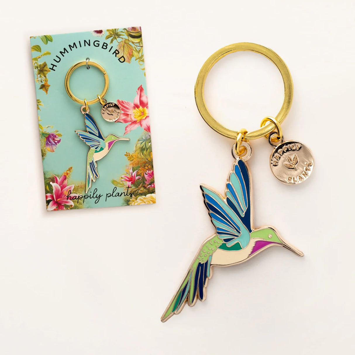 Hummingbird keychain with packaging on a white background