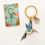 Hummingbird keychain with packaging on a white background