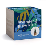 A square lavender grow kit box by Sprigbox, featuring a colorful front panel with blue, green, and yellow botanical illustrations, white text reading 'lavender grow kit,' and a small plant-in-bowl graphic. The left side of the box is natural wood-toned and reads 'lavender grow kit.