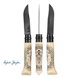 Three of the Cosmos knife with black blade shown at three different angles to show the designs of the handle on a white background