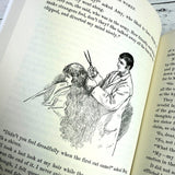 interior page of Little Women showing antique typeface and vintage illustration of Jo getting her hair cut short