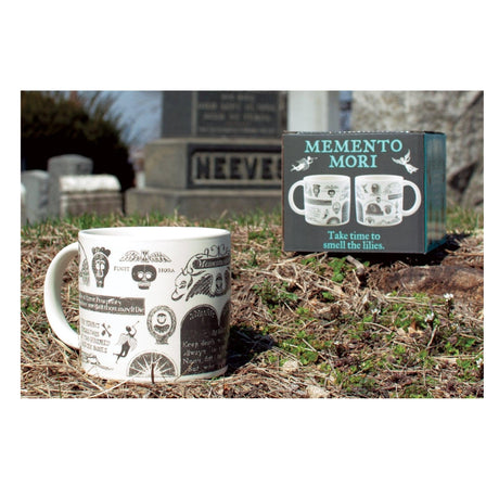 Memento Mori mug with decorative design in front of a gravestone