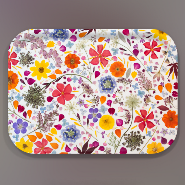 Colorful floral patterned tray on a gray background
