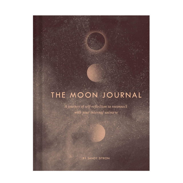 Book cover of 'The Moon Journal' with celestial moon phase design