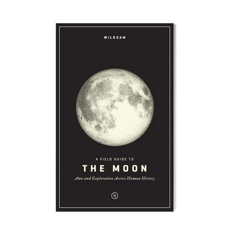 the cover image for a field guide to the moon - black cover with full moon image and white text